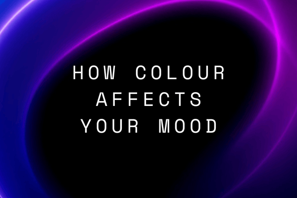 Title image with how colour affects your mood text with a purple pink swirl gradient pattern on a black background. 
