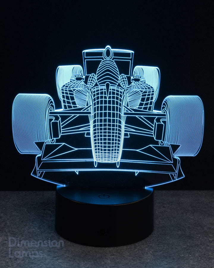 Cyan illuminated 3D racing car lamp on a dark background. boys gift idea Australia.
