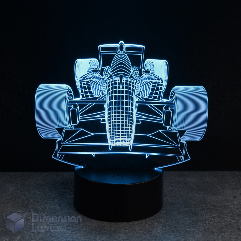 Cyan illuminated 3D racing car lamp on a dark background. boys gift idea Australia.