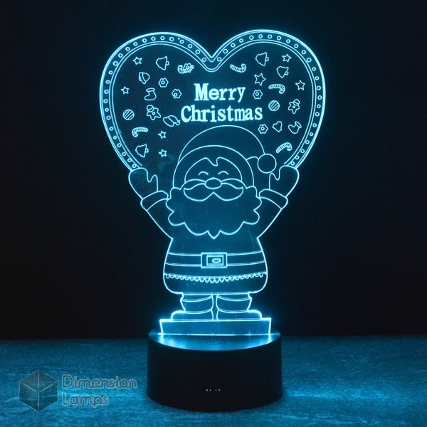 Santa Heart 3D lamp: festive Christmas decoration. Features Santa Claus holding a heart with "Merry Christmas", ideal for seasonal decor.