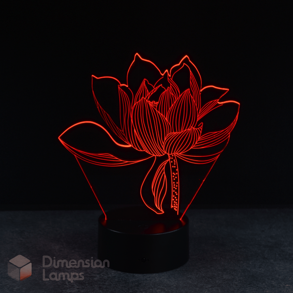 A 3D lamp in the shape of a lotus flower emits a red light, standing on a circular black base against a dark background. This floral design night light would add a warm touch to any space in Australia.