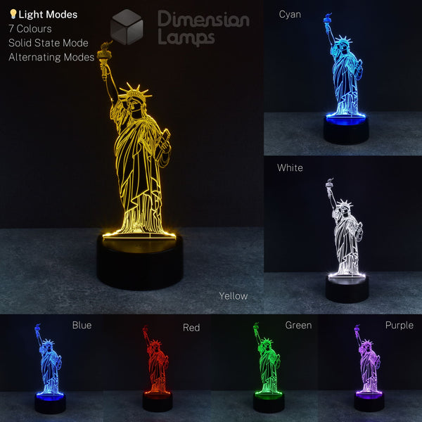 Seven colour variations are displayed for a 3D nightlight featuring the Statue of Liberty. The collage shows the iconic landmark illuminated in yellow, blue, white, cyan, red, green, and purple, each on a black base against a dark background. A cool 3d night lamps choice.