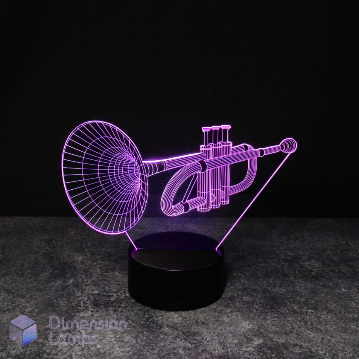 A 3D illusion lamp presents a detailed image of a trumpet, illuminated in purple, emanating upwards from a base against a dark background. A distinctive and engaging gift idea for trumpeters and brass players. 