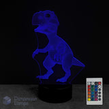 3D baby dinosaur lamp with 16 colour remote control on a dark background. For kids that adore dinosaurs.