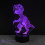 3D baby dinosaur lamp with a purple hue on a dark background. Night light for dinosaur lovers.