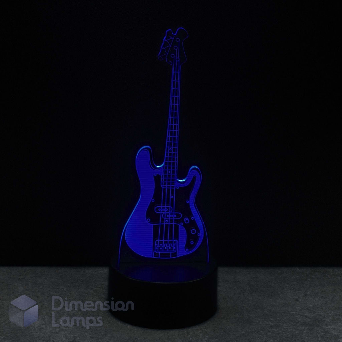 Bass guitar 3d led lamp illusion lamp emitting a blue light on a dark background. Bass player birthday present. 