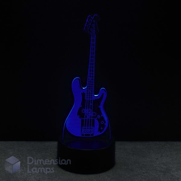 Bass guitar 3d led lamp illusion lamp emitting a blue light on a dark background. Bass player birthday present. 