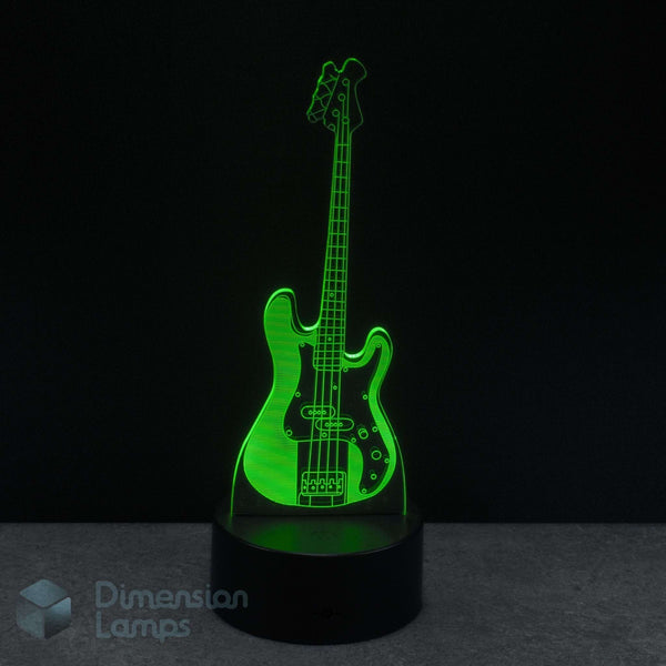 Bass guitar LED lamp glowing green on a black background with 'Dimension Lamps' branding. Present for bass player. 
