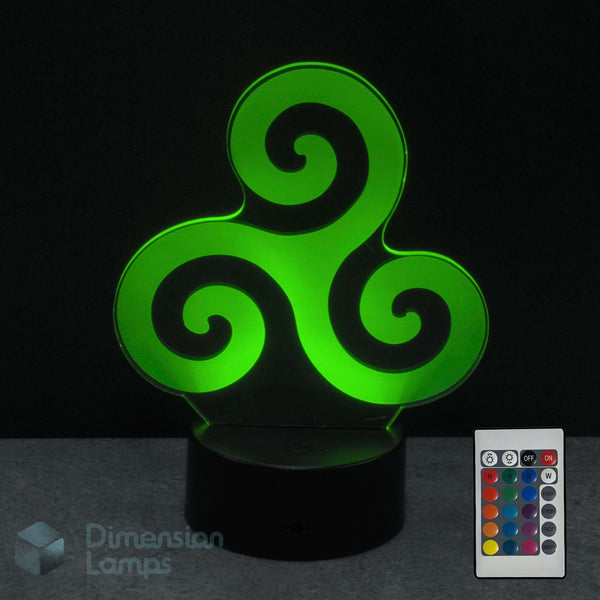 A 3D optical illusion night light with a glowing green Celtic triskelion design on a black base, shown with a remote control and a 'Dimension Lamps' logo overlay against a dark background.
