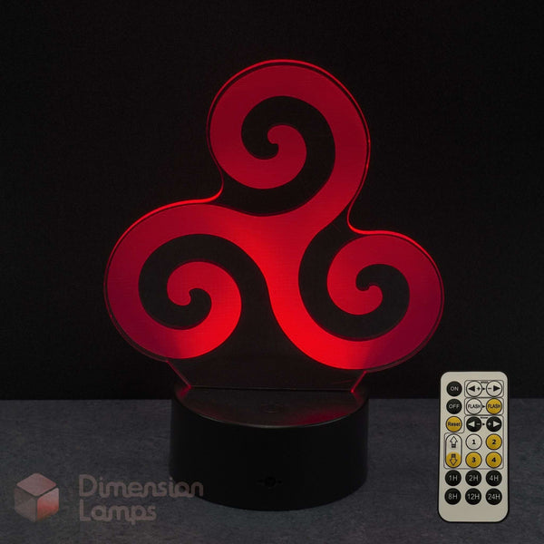 A red triple spiral LED night light on a black base with a white remote control, shown against a dark background with a 'Dimension Lamps' watermark.