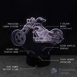 Motorcycle-shaped night light with features listed on a black background