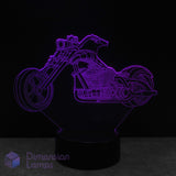 Motorcycle Harley Chopper style night light glowing purple on a black background