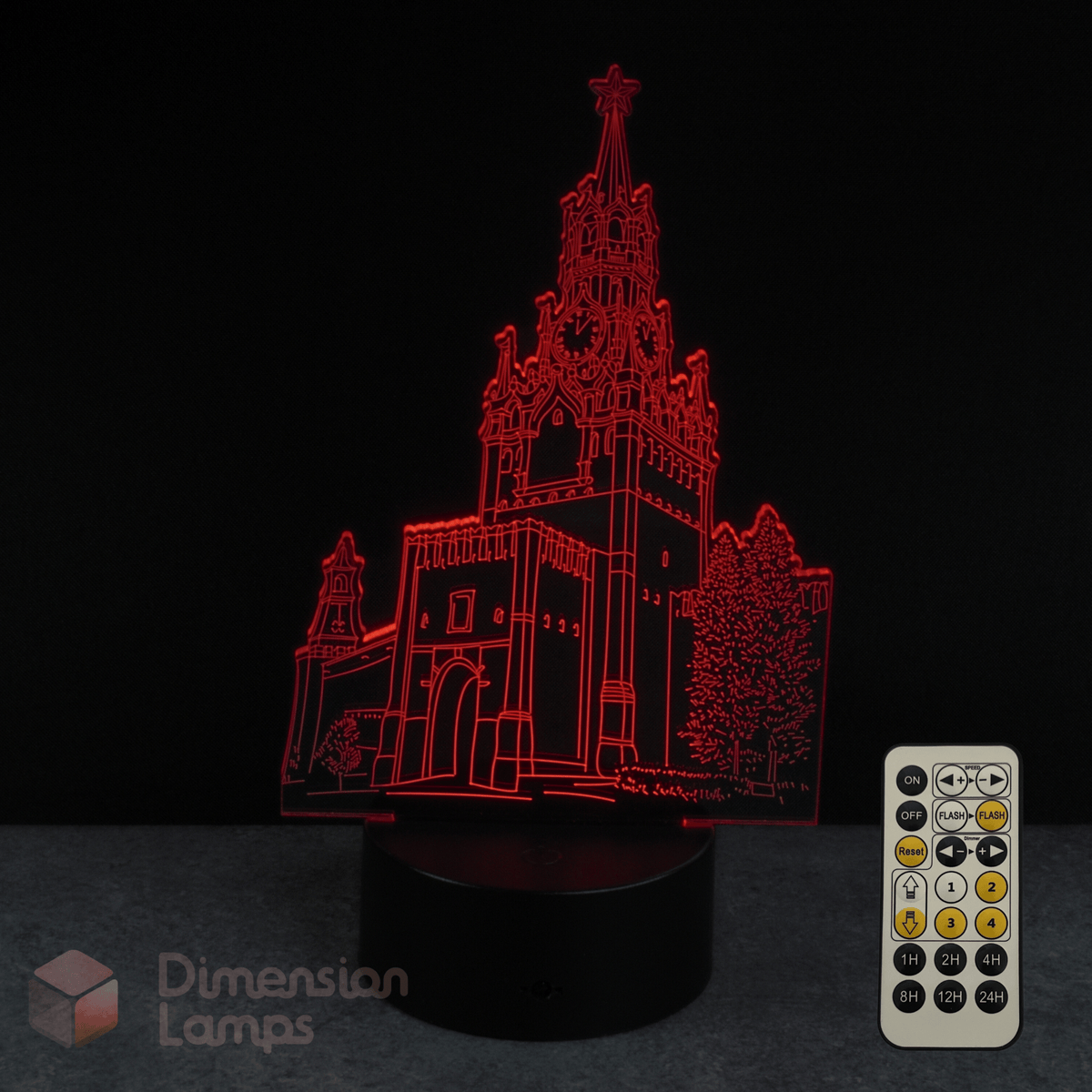 3D LED lamp with architectural design and remote control on a dark background
