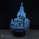 3D architectural model of a cathedral kids nightlight illuminated with blue light on a black background
