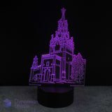 3D LED lamp shaped like a castle on a black background. Kids nightlight.