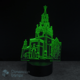 Kids nightlight 3D architectural model lamp with green lighting on a black background