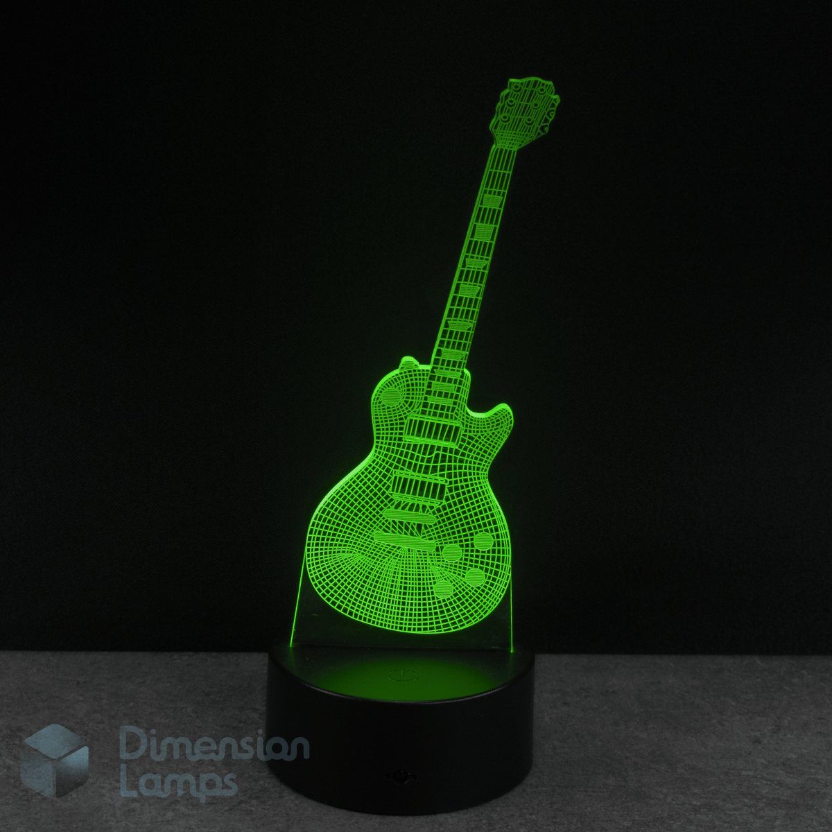 Guitar-shaped lamp emitting a green light. Lucille themed guitar gift idea.  