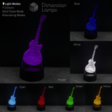 Guitar-shaped lamp displaying various colour modes, vintage guitarist fan gift idea.