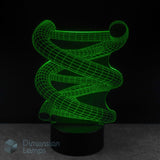 Green DNA Strand Double Helix lamp on a black background, chemistry student gift idea.
