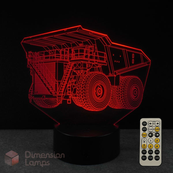 3D mining dump truck-shaped lamp with remote control on a dark background