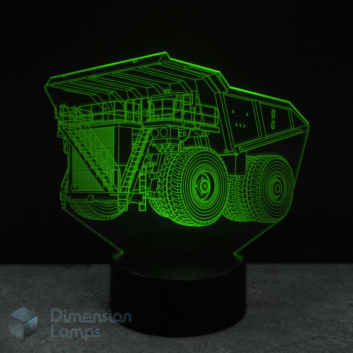 3D truck-shaped lamp with green light on a black background. Mining equipment themed gift.