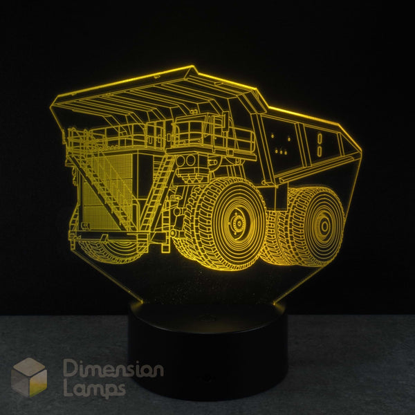 3D lamp shaped like a dump truck with yellow outline on a black background