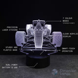 Formula one car-shaped night light with technical specifications on a black background