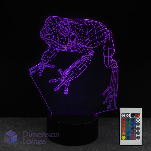 3D frog lamp with remote control on a dark background