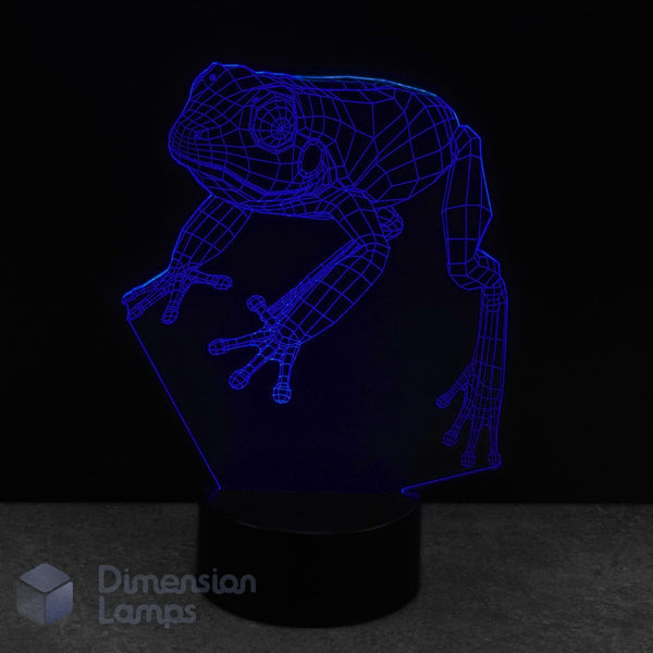 3D frog-shaped lamp with blue outline on a black background. Kids frog lamp.