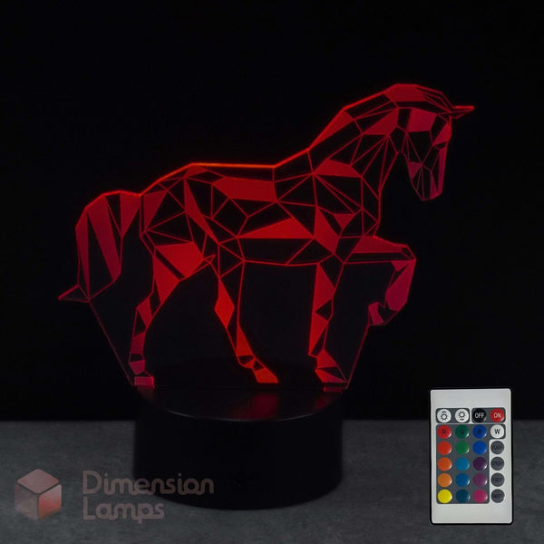 A unicorn 3D optical illusion lamp, glowing red on a black base against a black background with a remote control and a 'Dimension Lamps' logo overlay.