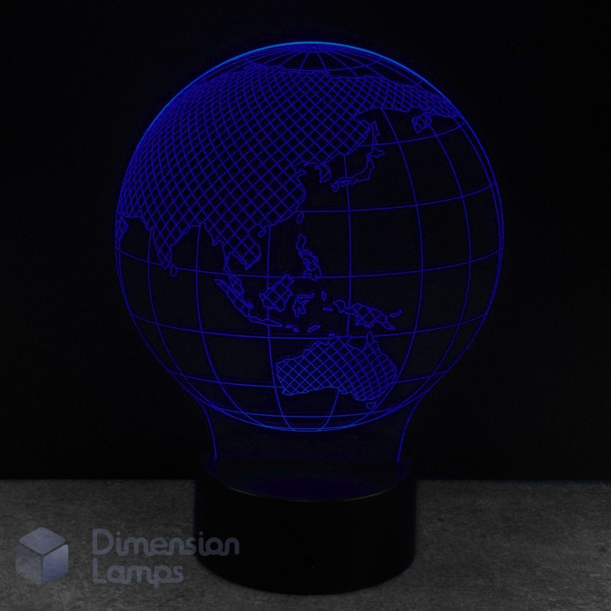 A 3D globe lamp glowing against a dark background. Kids 3d planet night light. 