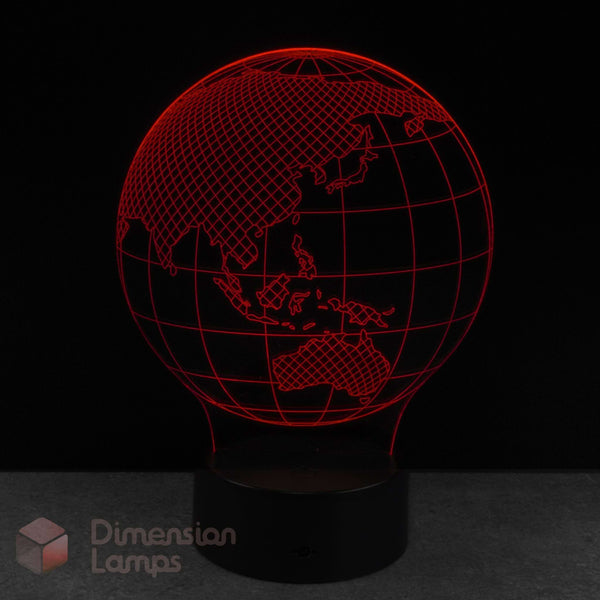 Wireframe globe lamp displayed in red on a black background. Kids world map gift idea. 