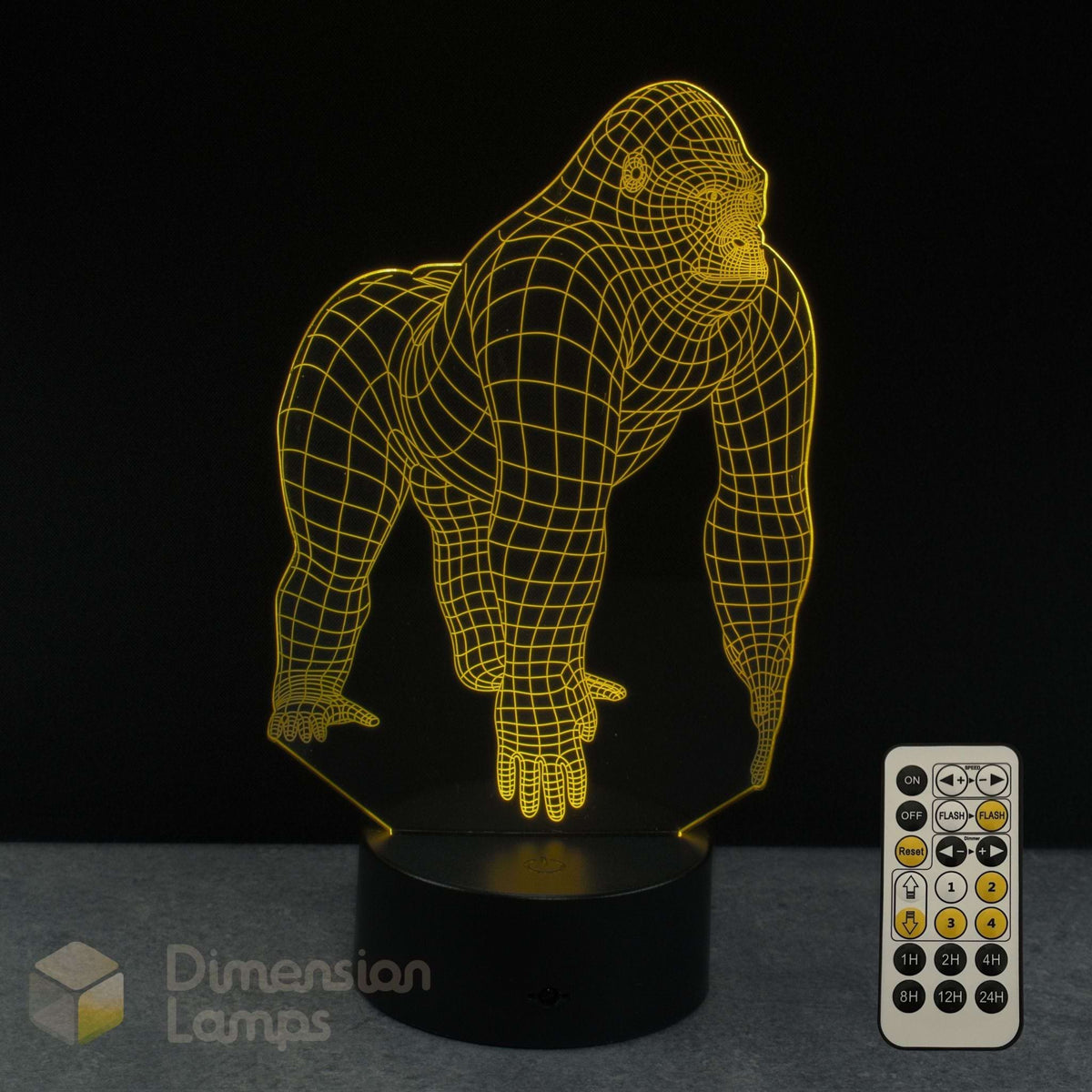A gorilla 3D lamp with yellow wireframe outline on a black base, shown with a 7 colour remote control, a black background and a Dimension Lamps logo.