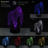 A gorilla 3D lamp shown in multiple colours purple, blue, white, cyan, red, green, and yellow. Including text labels and a Dimension Lamps logo.