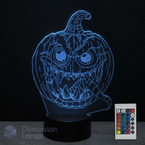 A glowing jack-o'-lantern night light with a black base, on a dark background with a 16 colour remote control and the Dimension Lamps logo visible.