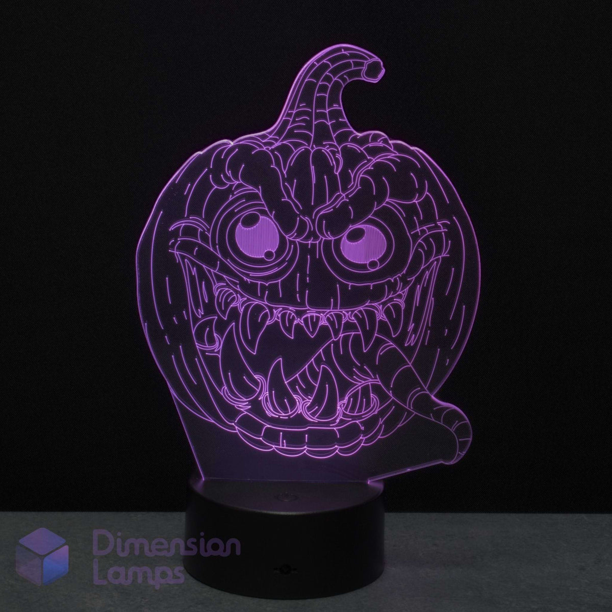 A 3D optical illusion night light of a spooky jack-o'-lantern, glowing purple on a black base and a dark background. Perfect for Halloween lighting.