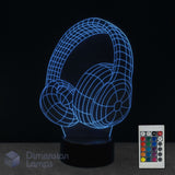 Aussie headphones 3D lamp glowing blue LED on a black base. A 16 colour remote control and the Dimension Lamps logo is visible in the bottom corner.