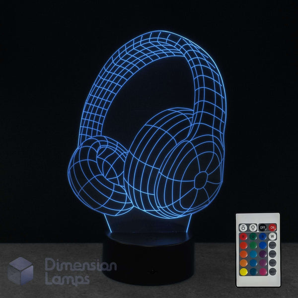 Aussie headphones 3D lamp glowing blue LED on a black base. A 16 colour remote control and the Dimension Lamps logo is visible in the bottom corner.