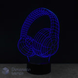 A 3D LED night lamp of over-ear headphones, glowing with a vibrant blue wireframe design on a black base against a dark background. Music gift. 