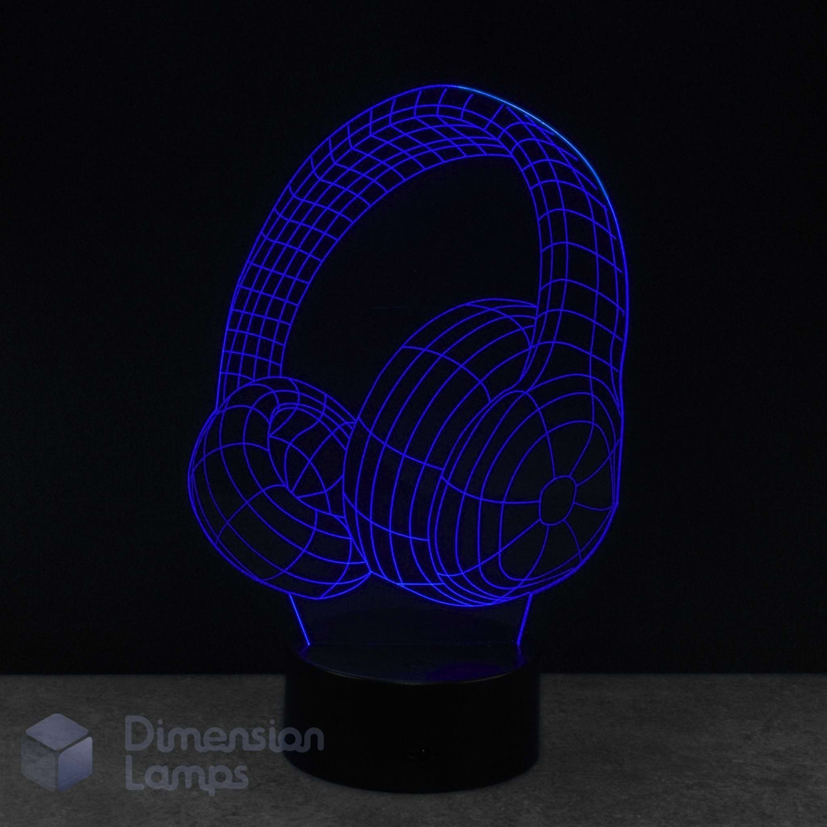 A 3D LED night lamp of over-ear headphones, glowing with a vibrant blue wireframe design on a black base against a dark background. Music gift. 