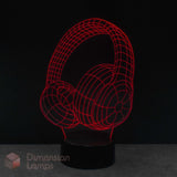 An LED night lamp of over-ear headphones, glowing with red wireframe lines on a black base with a Dimension Lamps logo. Ideal music fan gift idea. 