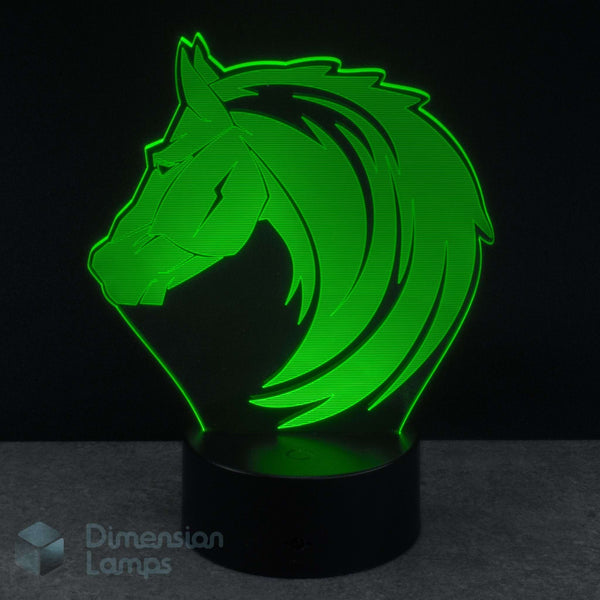 Green horse head design lamp on a black background, equestrian themed lamp.