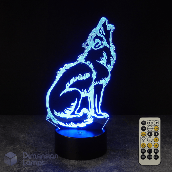 Wolf-shaped night light with remote control on a dark background