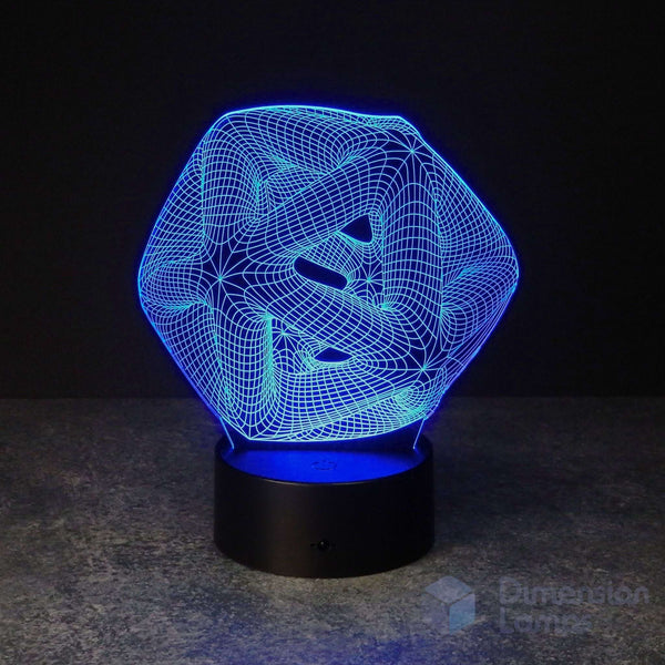 A 3D optical illusion LED lamp with a glowing blue geometric Icosahedron pattern on a black cylindrical base, set against a dark background.