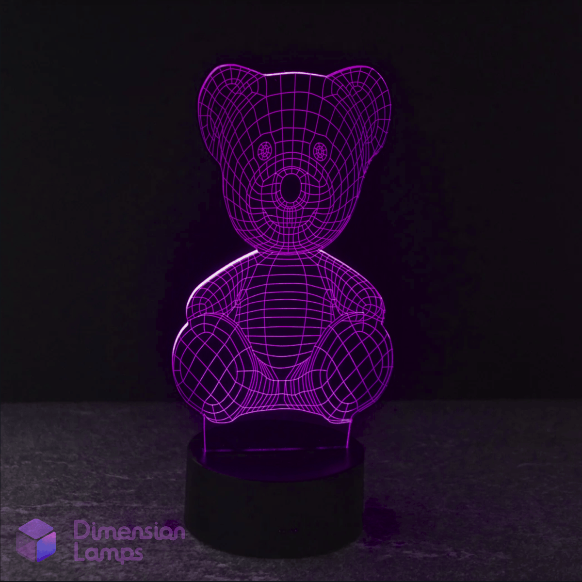 A purple illuminated Teddy Bear 3D LED lamp on a dark background, depicting a seated teddy bear figure.