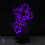 Purple cross-shaped LED lamp with 'Jesus' text on a black background.  Catholic teen gift idea.