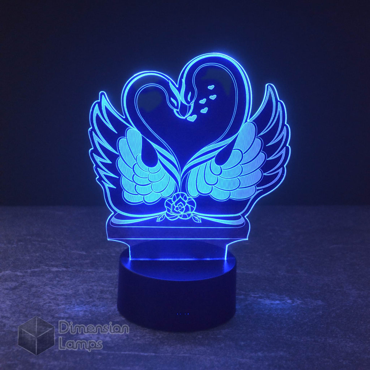 A serene blue Swan Kiss LED night light, perfect for creating a calming and loving atmosphere.