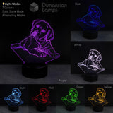 LED lamp with Labrador golden retriever puppy design in various colours on a dark background. Gift idea for young girls.