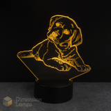 3D LED lamp shaped like a Labrador golden retriever puppy on a black background with 'Dimension Lamps' branding. Gift idea for girls who love puppies.