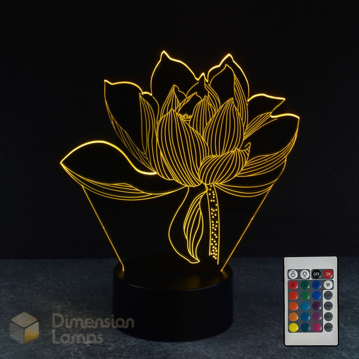 The elegant form of a lotus flower is captured in this 3D lamp, glowing in green. It rests on a round black base, set against a dark backdrop. Featuring a 16-colour remote control version.